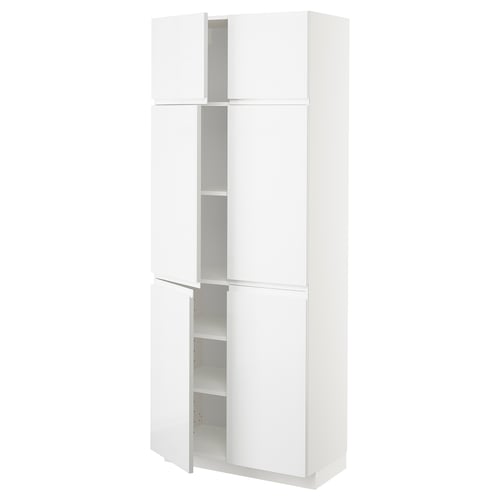 A white METOD high cabinet from IKEA. It has four doors with a high gloss finish, providing a modern and sleek storage solution.
