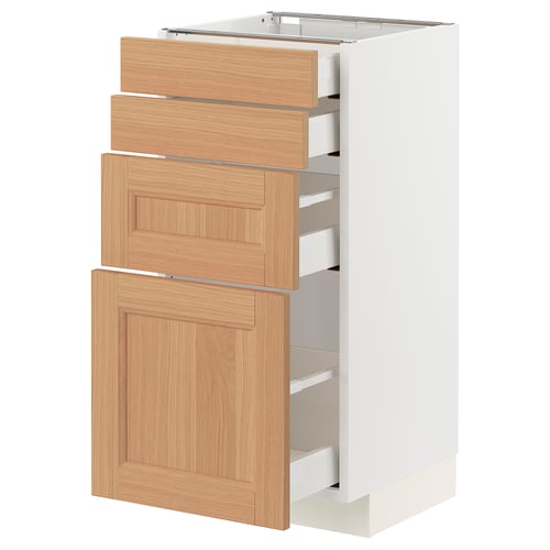 A white kitchen cabinet with wooden drawers and doors, featuring a modern design with smooth, light brown oak finish.