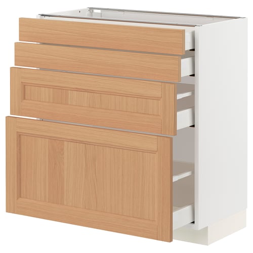 An ikea METOD kitchen unit with light oak drawers and a white base.