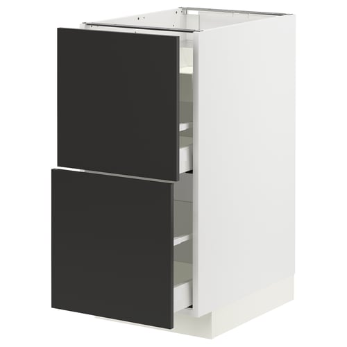A white and black modern kitchen cabinet with drawers.