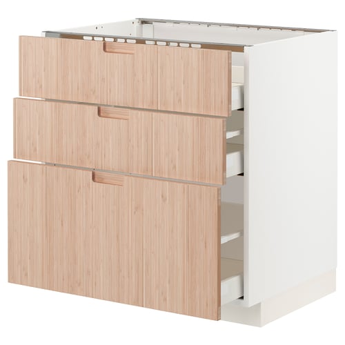 Modern light wood drawer cabinet, white frame, three large drawers, sleek design.