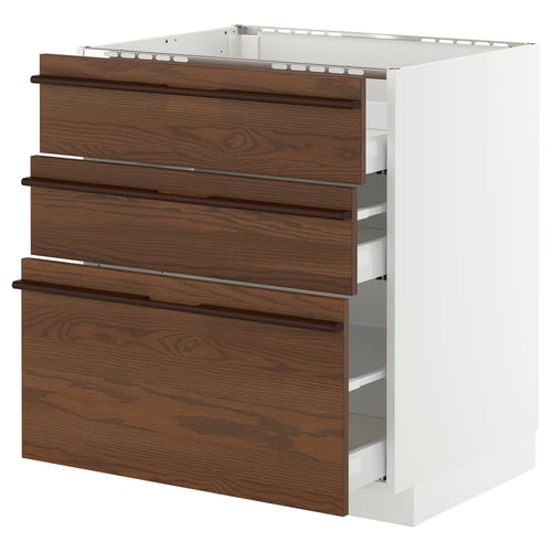 White METOD kitchen cabinet with dark brown wood drawers.