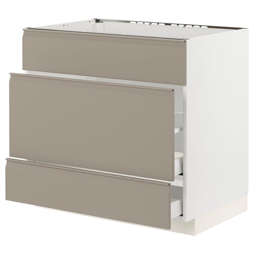 Photo: modern kitchen cabinet. METOD system. Light beige. Three drawers. Metal and laminate. Rectangle shape. Integrated handles.