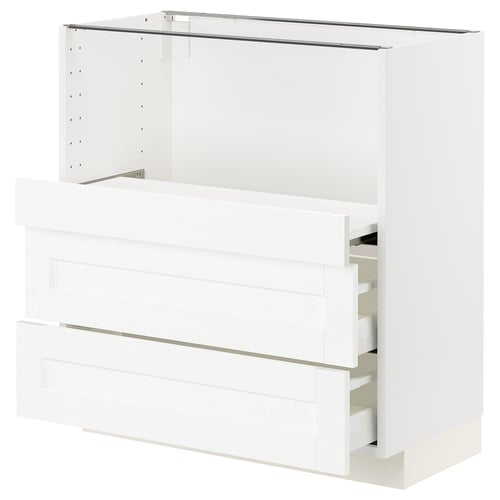 White METOD kitchen cabinet with multiple drawers, sleek design.