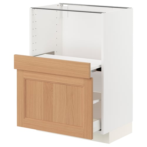 Ikea METOD kitchen unit in white with oak drawers. Modern, minimalist design with smooth fronts.