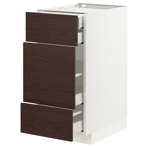 Modern kitchen unit, white base, dark brown wood drawers, three drawers, sleek design.