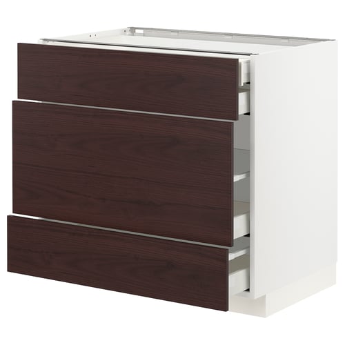 A white METOD kitchen cabinet with 3 dark drawers, modern & sturdy design.