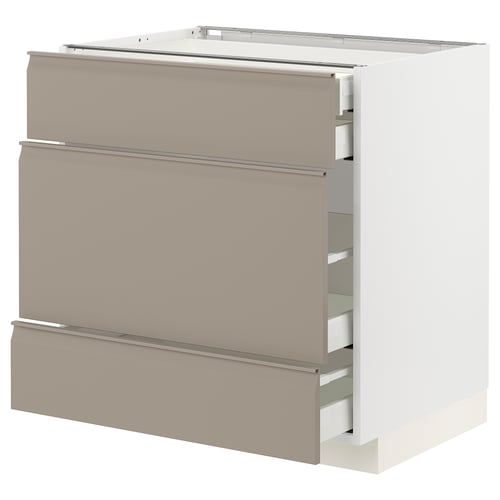 Modern, beige kitchen cabinet with three integrated handles and smooth-closing drawers.