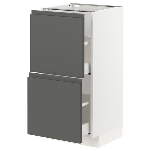 White kitchen cabinet with dark grey drawers and doors, modern design.