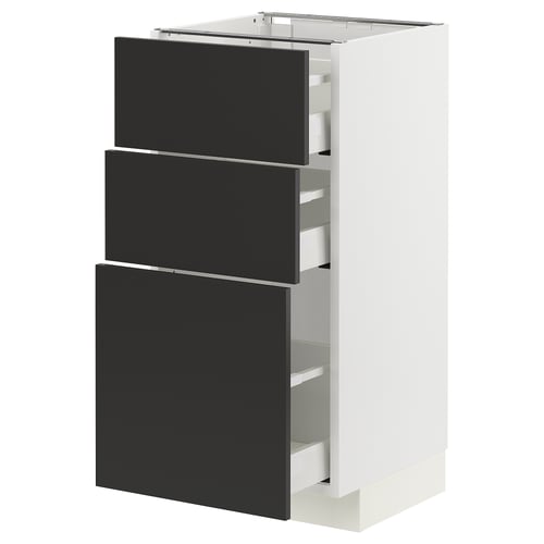 Modern kitchen cabinet in white with three black drawers, sleek design.