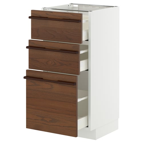 This image shows an ikea METOD kitchen unit with dark brown wooden drawers and a white frame.