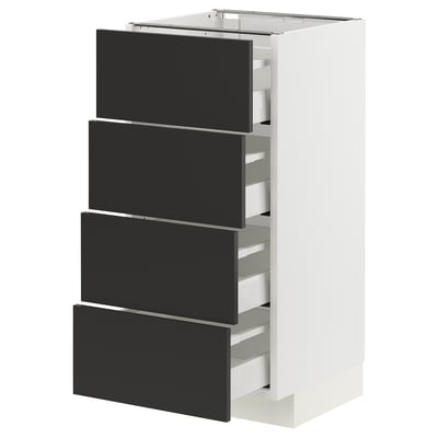 METOD kitchen unit with four black nickebo drawers. White frame with sleek modern design.