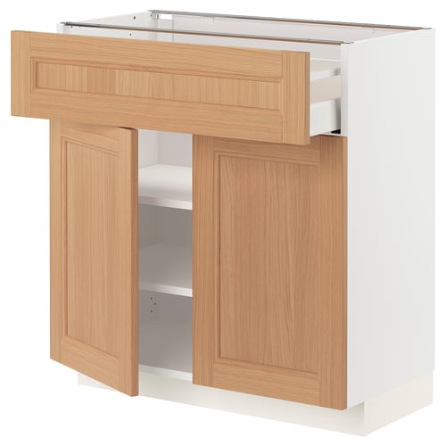 Light wood & white kitchen cabinet, modern design with adjustable shelves & drawers.
