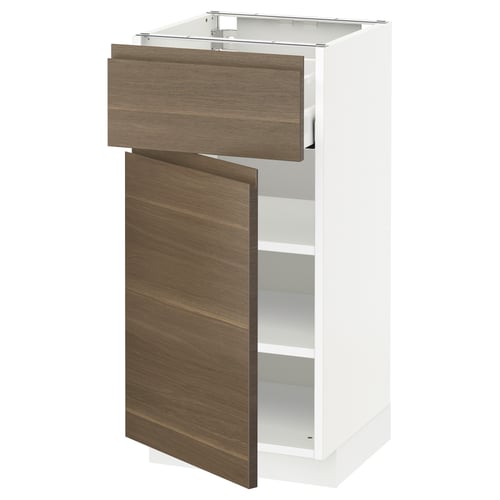 A modern white kitchen cabinet with a wooden drawer and door in dark walnut. It adjustable shelves and a soft-close drawer.