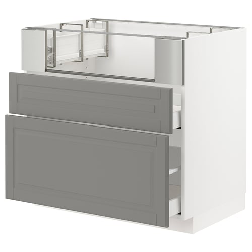 A grey METOD kitchen cabinet with multiple drawers and shelves, featuring a traditional design with bevelled edges.