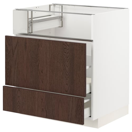 An ikea METOD kitchen cabinet in white with dark brown wooden drawers. It has a sleek design with metal handles.