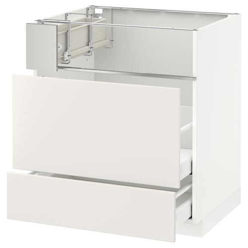White METOD kitchen cabinet with smooth veddinge drawers and metal shelf.