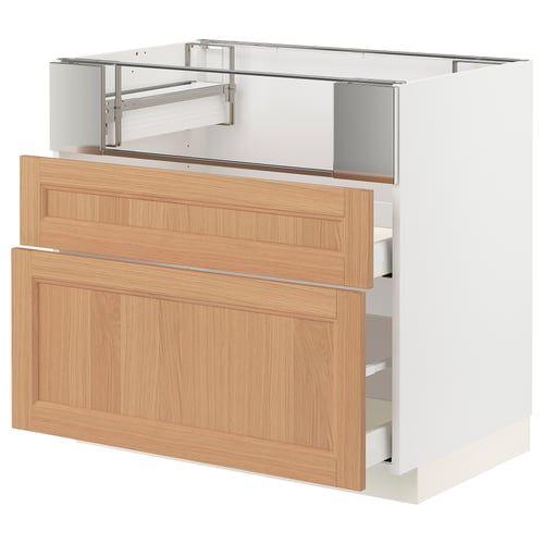 This image shows a white and wooden METOD kitchen cabinet with two pull-out drawers and adjustable shelves.