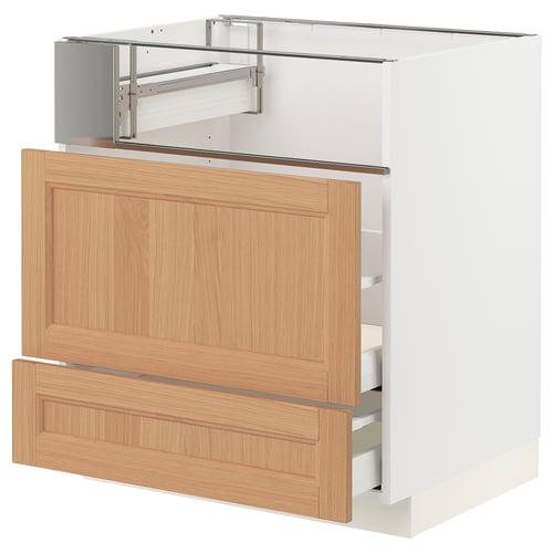Modern kitchen cabinet with light oak drawers and white base, featuring sleek handles and soft-closing drawers.
