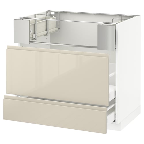A beige high gloss kitchen cabinet with two drawers and a metal frame.