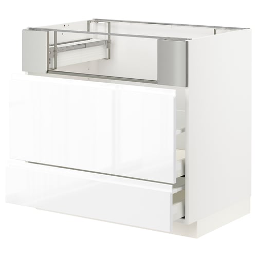 Modern white high gloss kitchen cabinet with smooth, soft-closing drawers, part of the METOD system.
