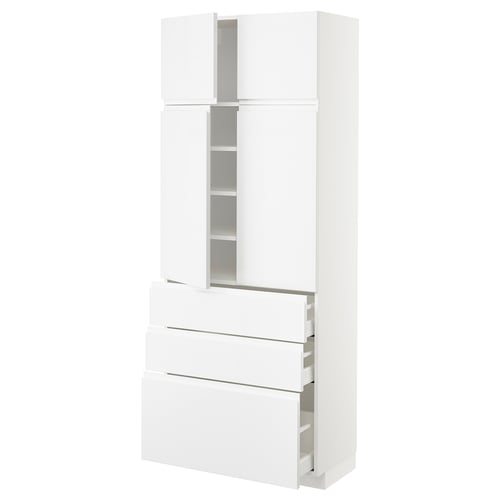 White ikea METOD kitchen cabinet with glossy finish, featuring multiple drawers and shelves, modern and sleek design.
