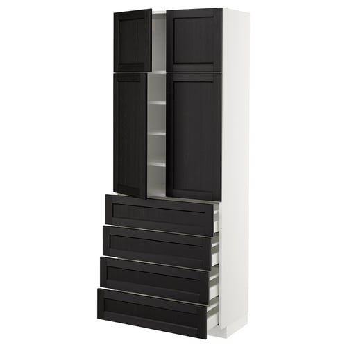 A METOD kitchen cabinet with black-stained wooden doors and drawers. It adjustable shelves and soft-closing drawers with a white frame.