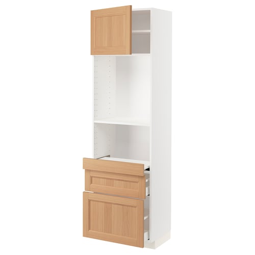 White METOD kitchen cabinet with oak drawers and door.