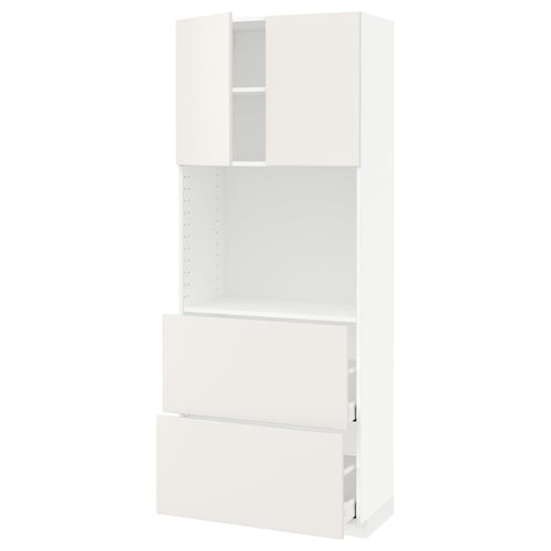 White METOD kitchen unit with shelves and drawers.