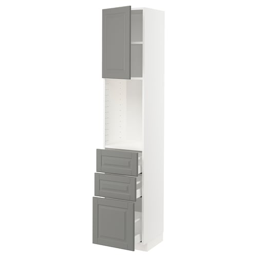 A white METOD kitchen cabinet with grey bodbyn fronts, featuring a traditional design with adjustable shelves and smooth-running drawers.