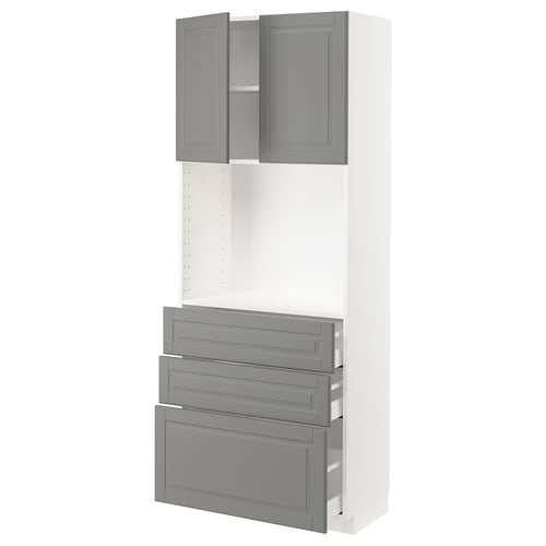 White METOD kitchen unit with grey drawers and cabinets.
