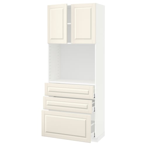 A white METOD kitchen unit with off-white bevelled drawers and doors made of fiberboard and particleboard.