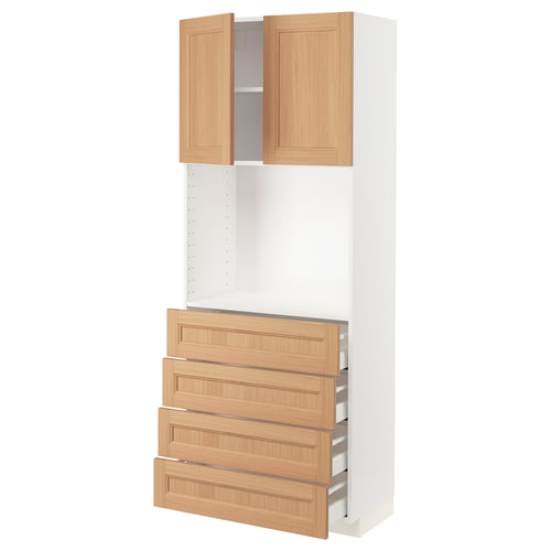 A white METOD kitchen unit with oak doors. It has two open upper cabinets and three wooden drawers below.