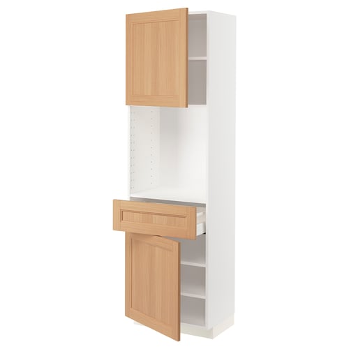 A white METOD kitchen cabinet with oak doors, one door open, revealing shelves.
