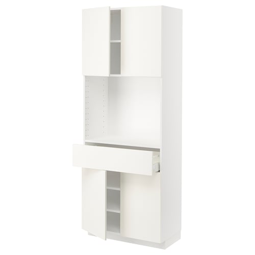 A white METOD kitchen cabinet with adjustable shelves and a drawer.