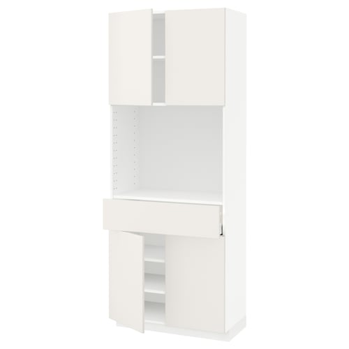 White METOD kitchen unit with multiple compartments, smooth cabinet doors, and adjustable shelves.