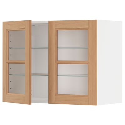 METOD oak wall cabinet with glass doors and adjustable shelves.
