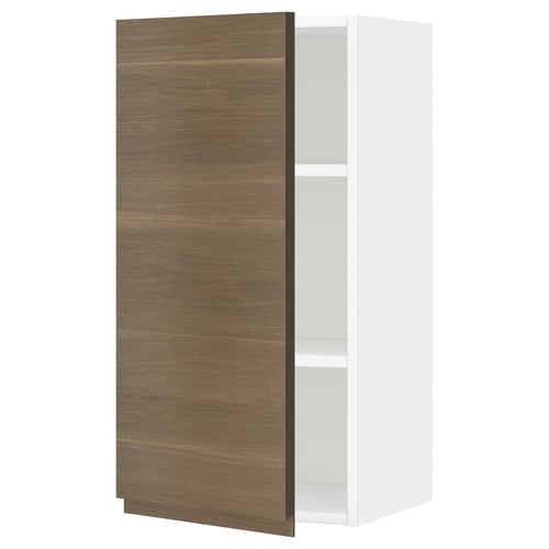 Modern white cabinet with dark wood door, minimalist design, single shelf.