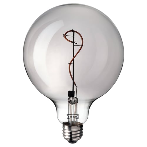 Ikea light bulb, MOLNART. Clear glass, spiral filament, warm light.