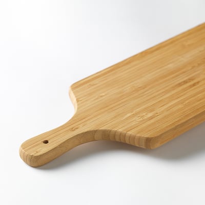 An OSTBIT wooden cutting board, light brown, rectangular with a handle.