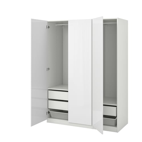 Open white PAX wardrobe, minimalist design, metal handles, mesh drawers, adjustable feet.