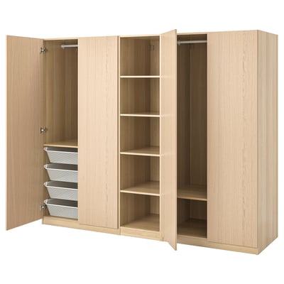 Ikea PAX light brown wood wardrobe, open showcasing shelves and drawers.