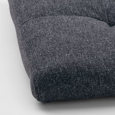 Image shows a POÄNG footstool with plush, dark grey gunnared fabric. The frame is sturdy and well-crafted for durability.