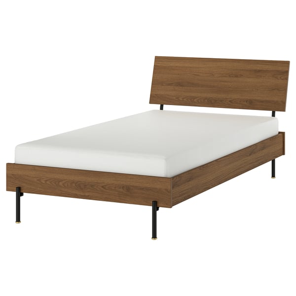 Mid-century style bed, walnut wood, white mattress, black legs, sleek design.