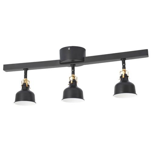 A RANARP ceiling track light. Its black with three adjustable spots. The design is industrial with metal construction.