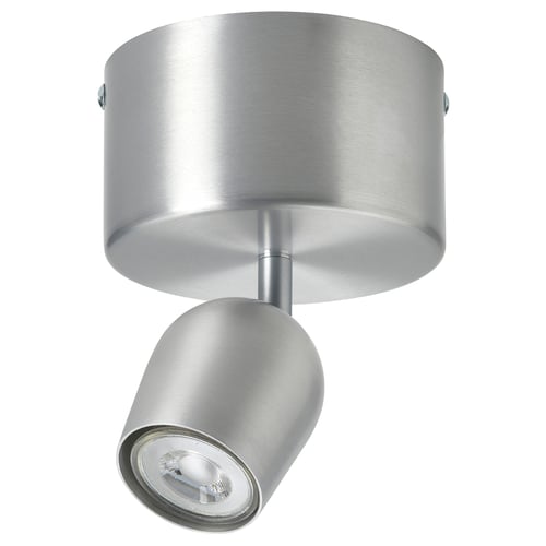 Modern silver ceiling spotlight, adjustable aluminium shade, directed light focus.