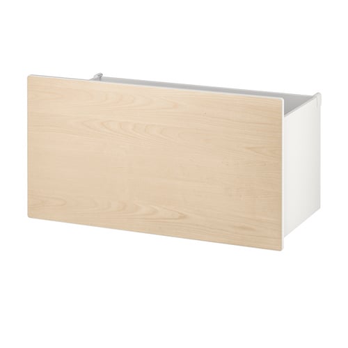 A SMÅSTAD storage box in light birch colour. It is rectangular with a smooth wooden front, a white frame, and four small wheels on the bottom.