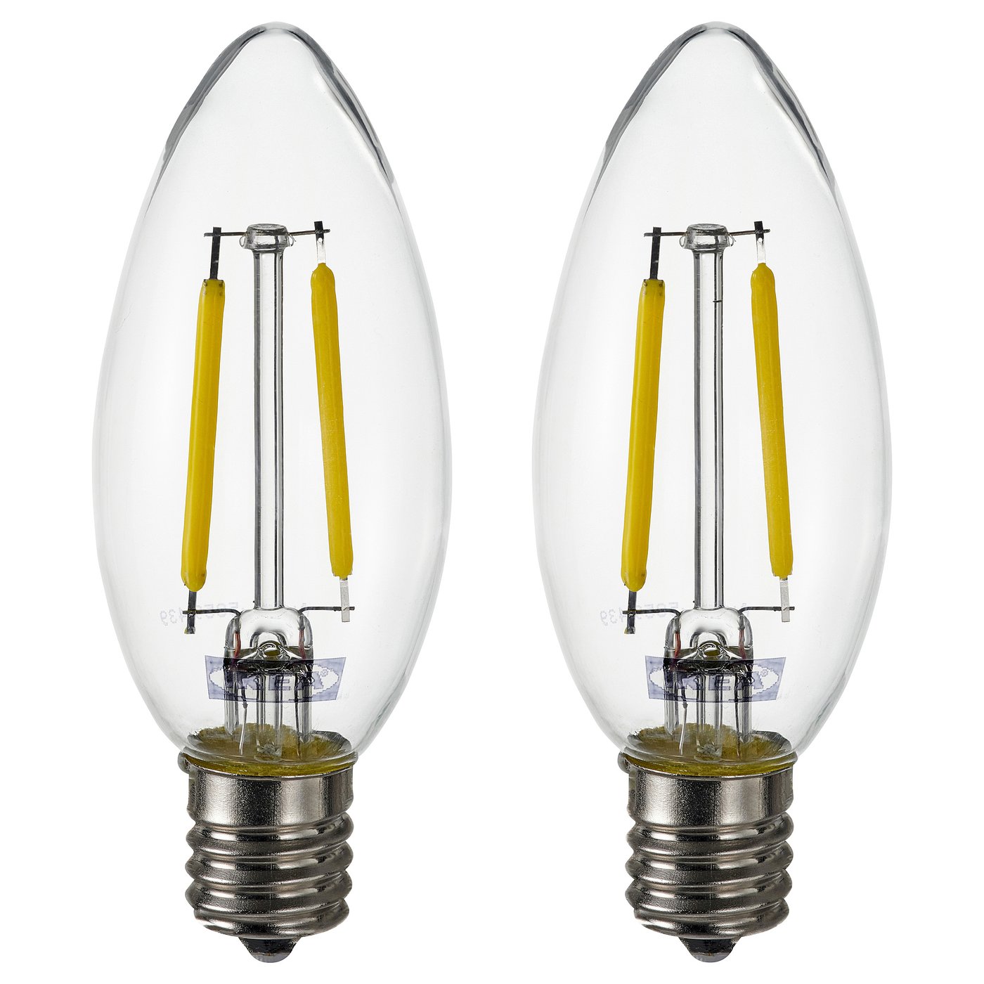 Two identical bulbs side by side. Clear glass with yellow led coils. E12 base. Rounded teardrop shape. No text.