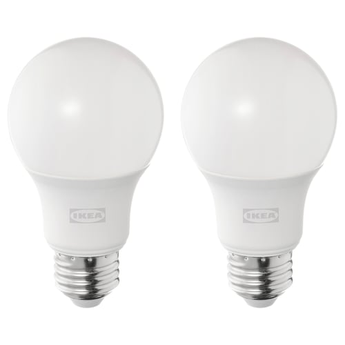 Two ikea led light bulbs, white, spherical shape, warm-white light, durable plastic and metal base.