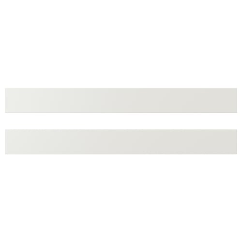 White rectangular furniture panels, fiberboard material, smooth design.